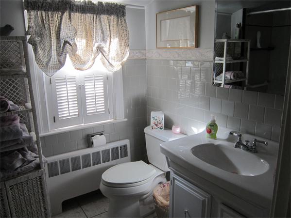 7 Hillcrest Road Marblehead, MA 01945 - Photo 12 of 15 a bathroom with a sink a toilet and a mirror
