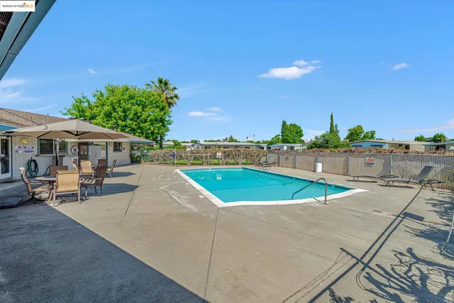 a view of outdoor space and swimming pool