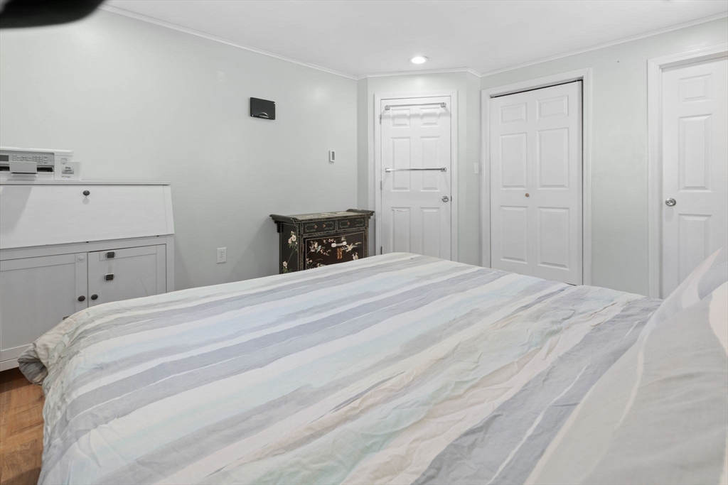 2 Brandywine Drive Hooksett, NH 03106 - Photo 12 of 42 a bedroom with a bed and cabinets