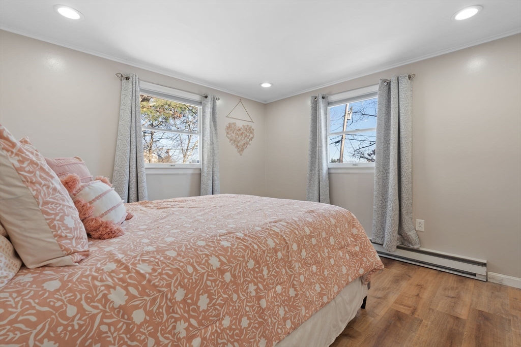 2 Brandywine Drive Hooksett, NH 03106 - Photo 13 of 42 a bedroom with a large bed and a window