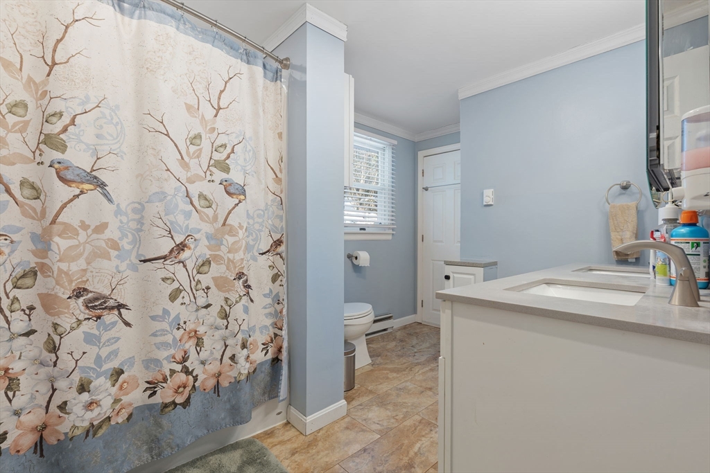 2 Brandywine Drive Hooksett, NH 03106 - Photo 20 of 42 a bathroom with a sink and a mirror