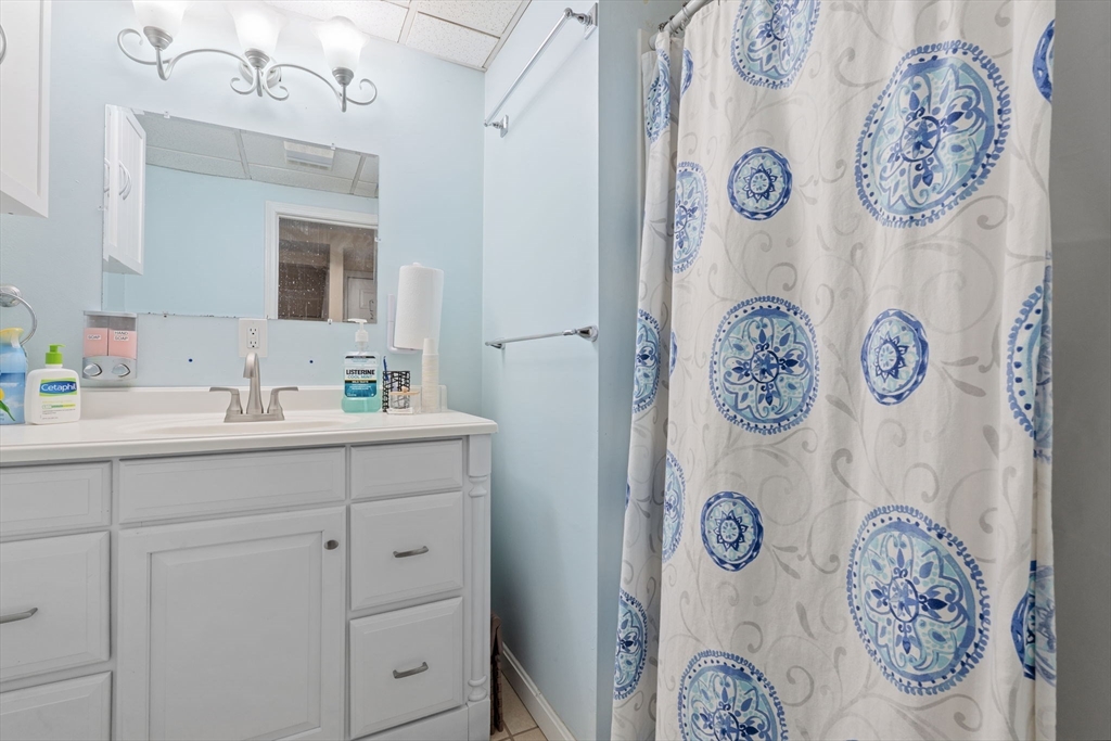 2 Brandywine Drive Hooksett, NH 03106 - Photo 24 of 42 a bathroom with a sink and a mirror