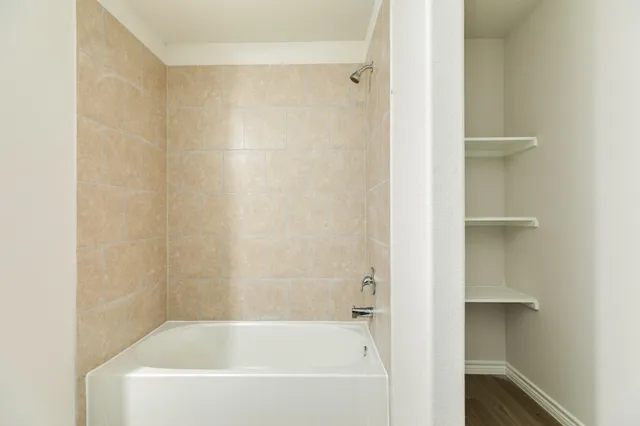 a bathroom with a bathtub