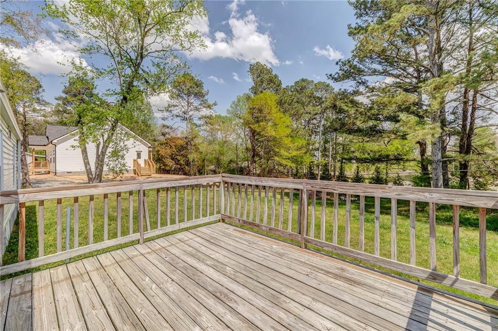 109 Webb Drive Northeast Calhoun, GA 30701 - Photo 15 of 49 a view of balcony with wooden floor and fence