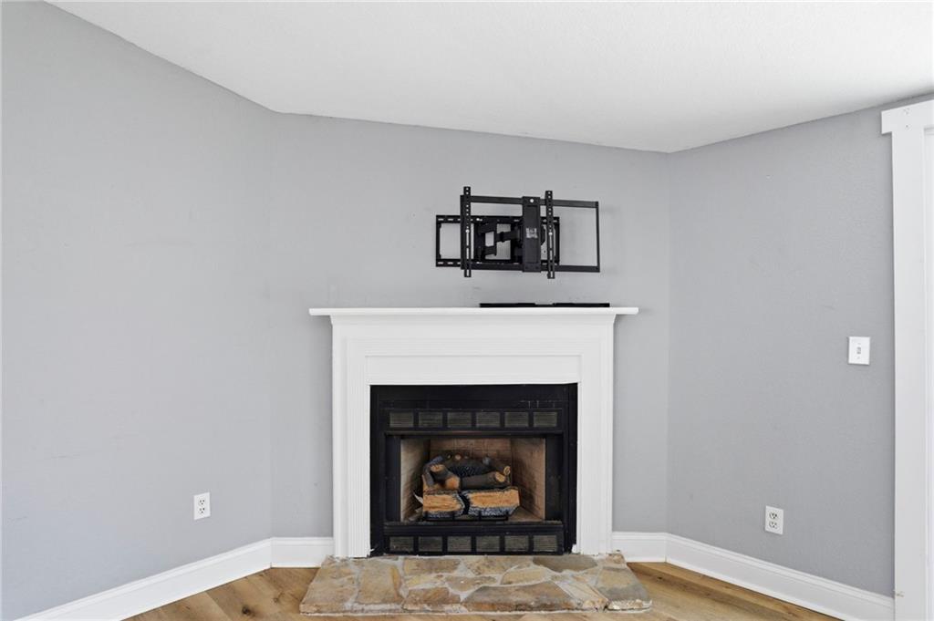109 Webb Drive Northeast Calhoun, GA 30701 - Photo 47 of 49 a living room with a fireplace