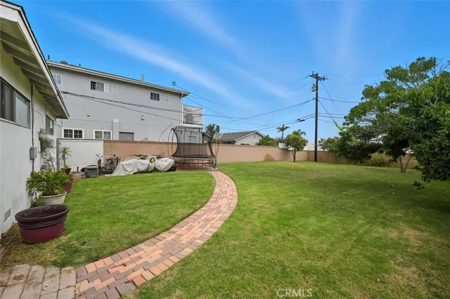 a view of a garden with an outdoor space