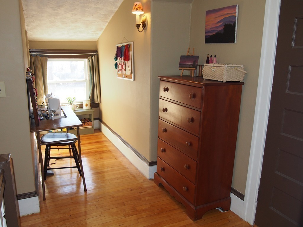 78 Beaconsfield Road Worcester, MA 01602 - Photo 11 of 30 a room with furniture and wooden floor