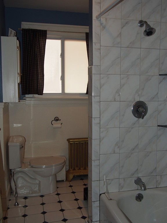 78 Beaconsfield Road Worcester, MA 01602 - Photo 17 of 30 a bathroom with a toilet and a shower