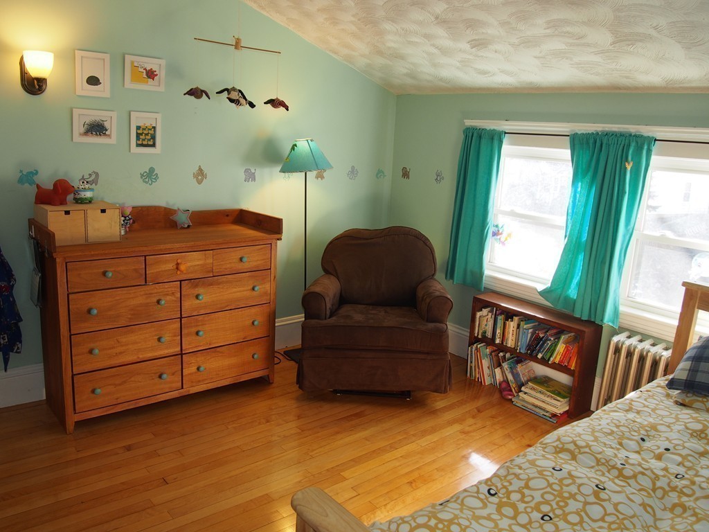 78 Beaconsfield Road Worcester, MA 01602 - Photo 20 of 30 a living room with furniture and a window