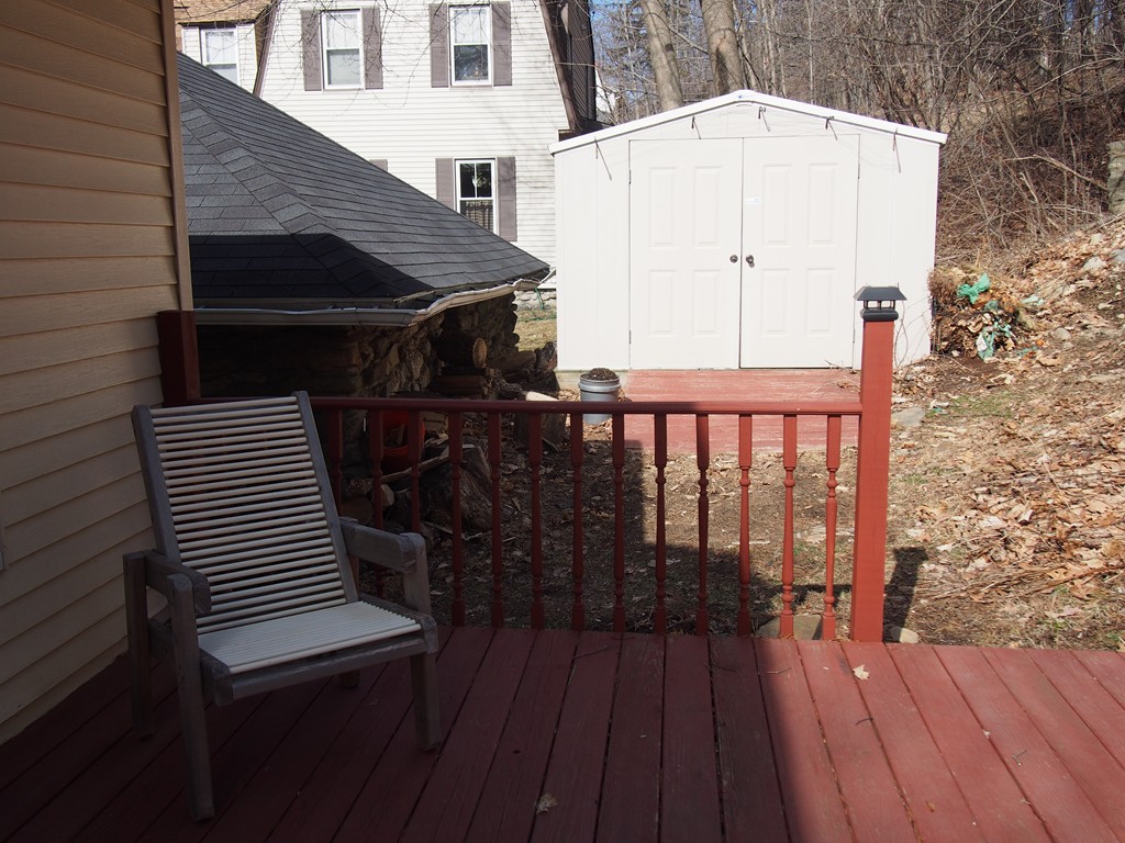 78 Beaconsfield Road Worcester, MA 01602 - Photo 30 of 30 a view of a balcony with wooden floor and fence