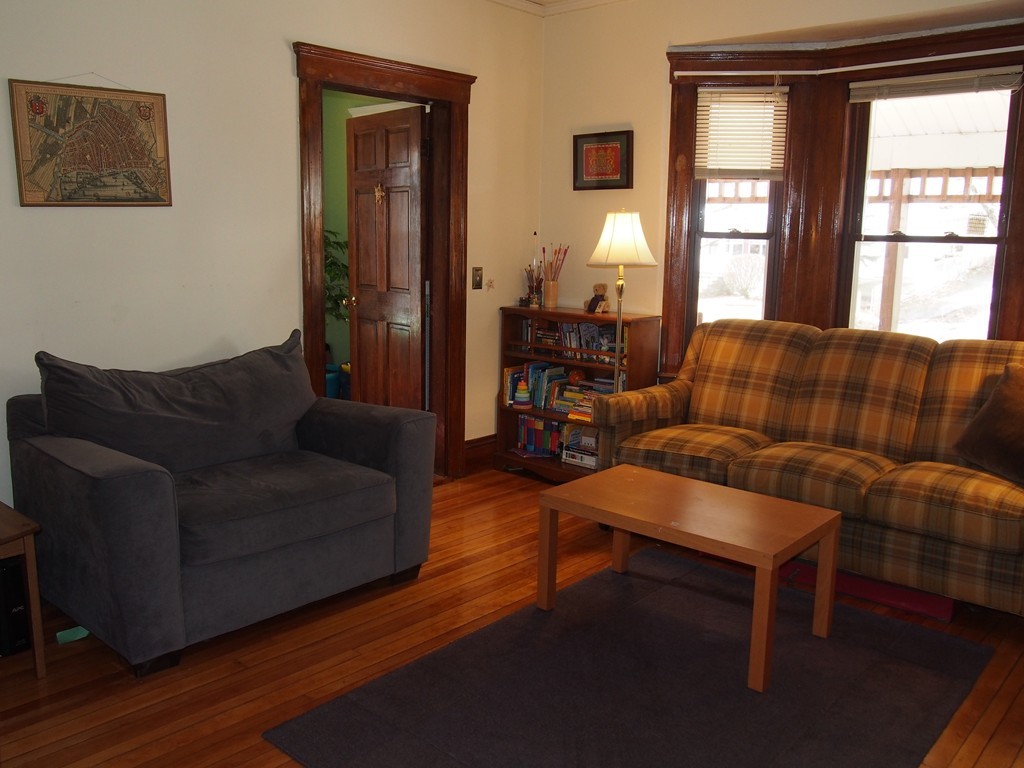 78 Beaconsfield Road Worcester, MA 01602 - Photo 4 of 30 a living room with furniture and a window