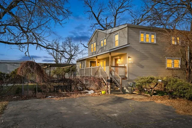 a view of a house with a street