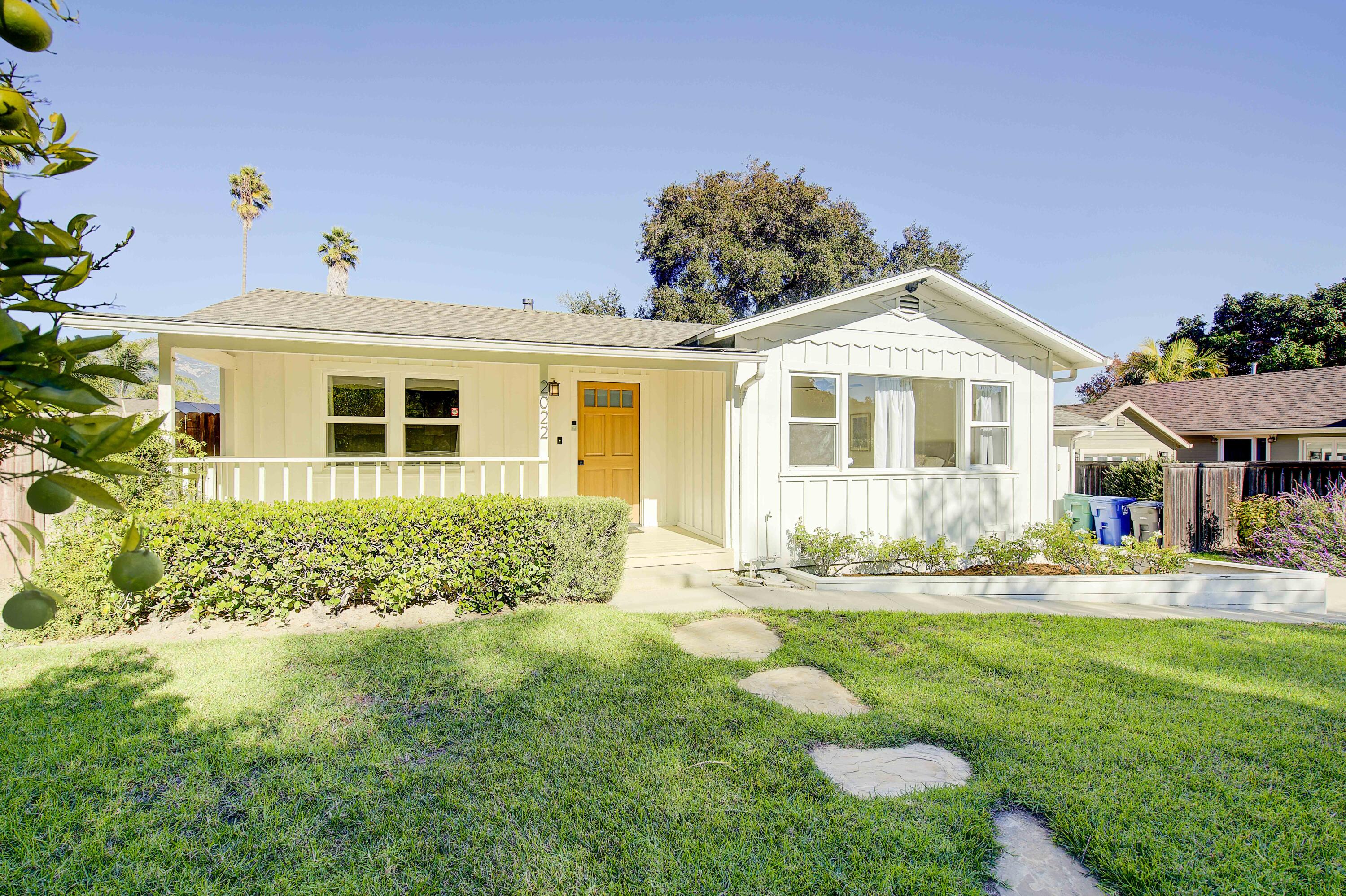 2022 Monterey Street Santa Barbara, CA 93101 - Photo 1 of 24 a front view of a house with a yard