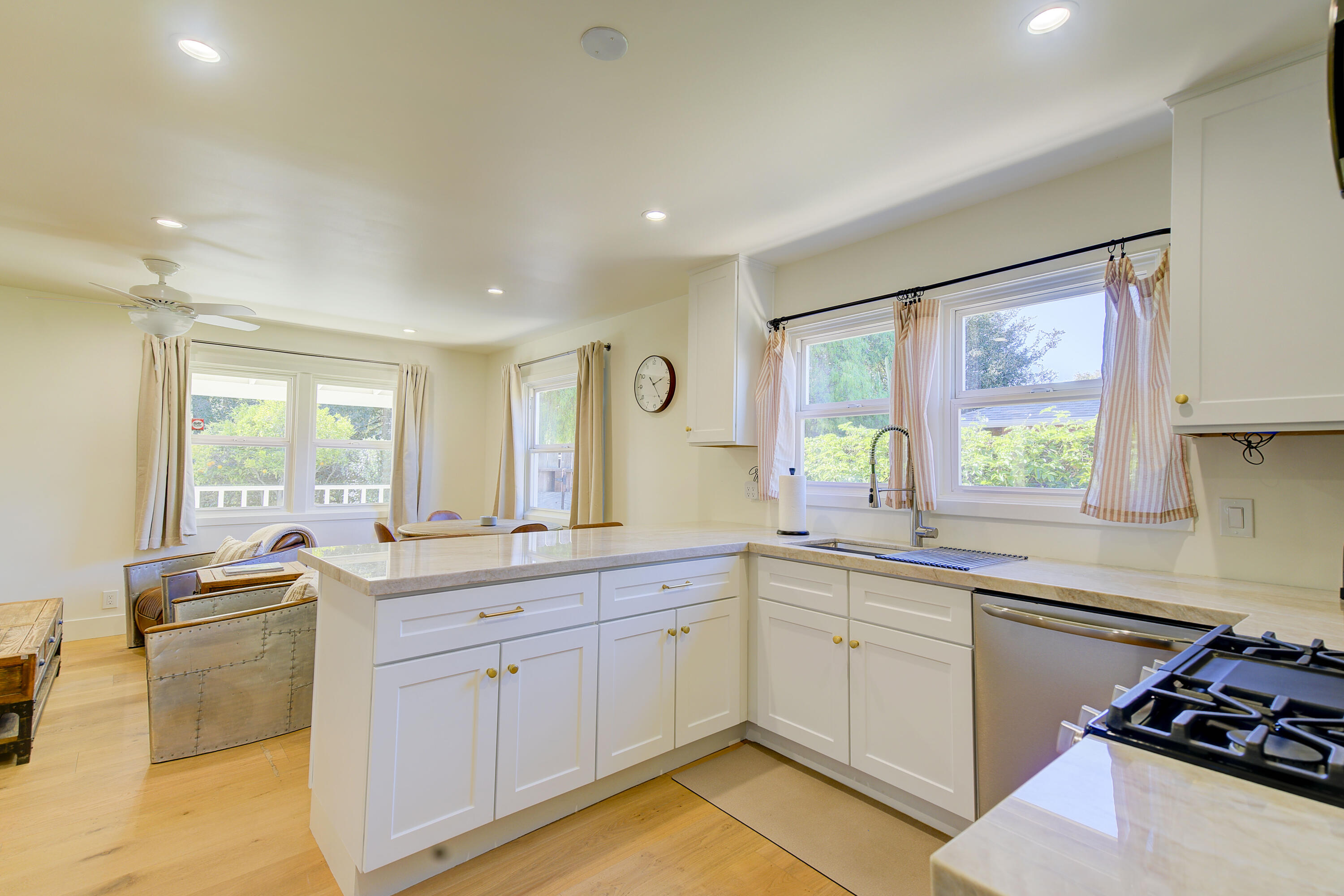 2022 Monterey Street Santa Barbara, CA 93101 - Photo 13 of 24 a kitchen with a sink stove and cabinets