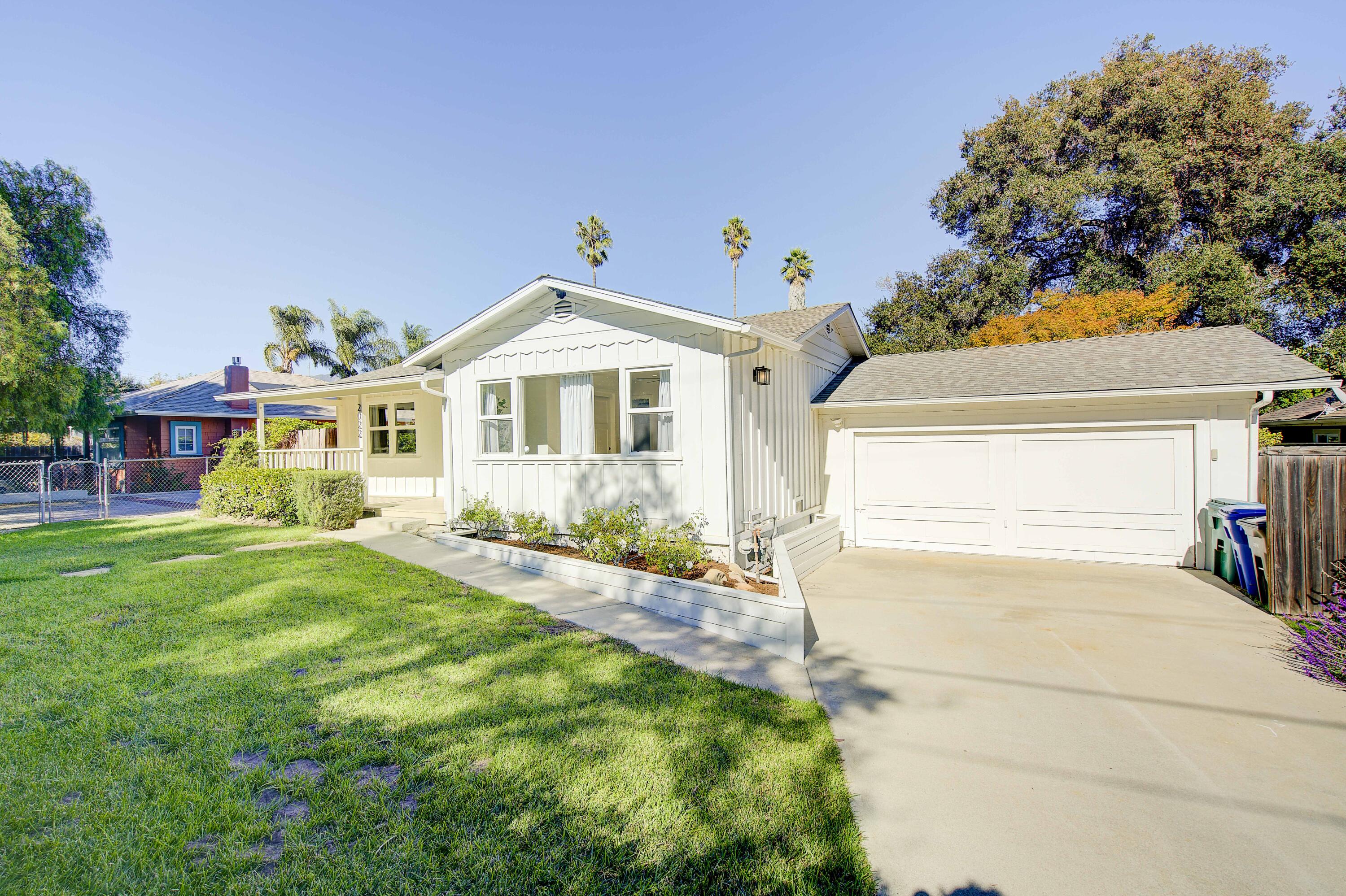 2022 Monterey Street Santa Barbara, CA 93101 - Photo 3 of 24 a front view of a house with a yard