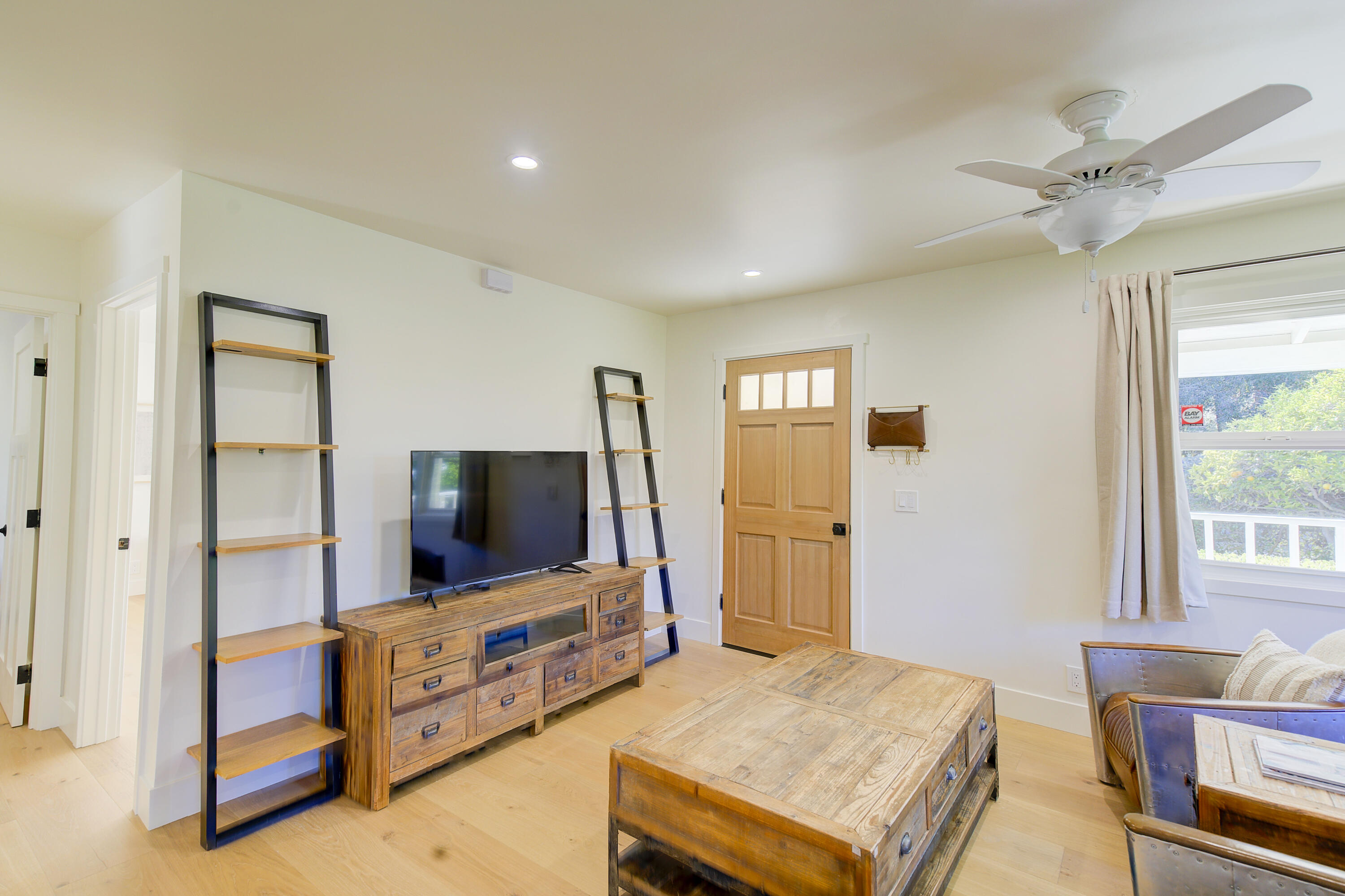 2022 Monterey Street Santa Barbara, CA 93101 - Photo 7 of 24 a living room with furniture and flat screen tv