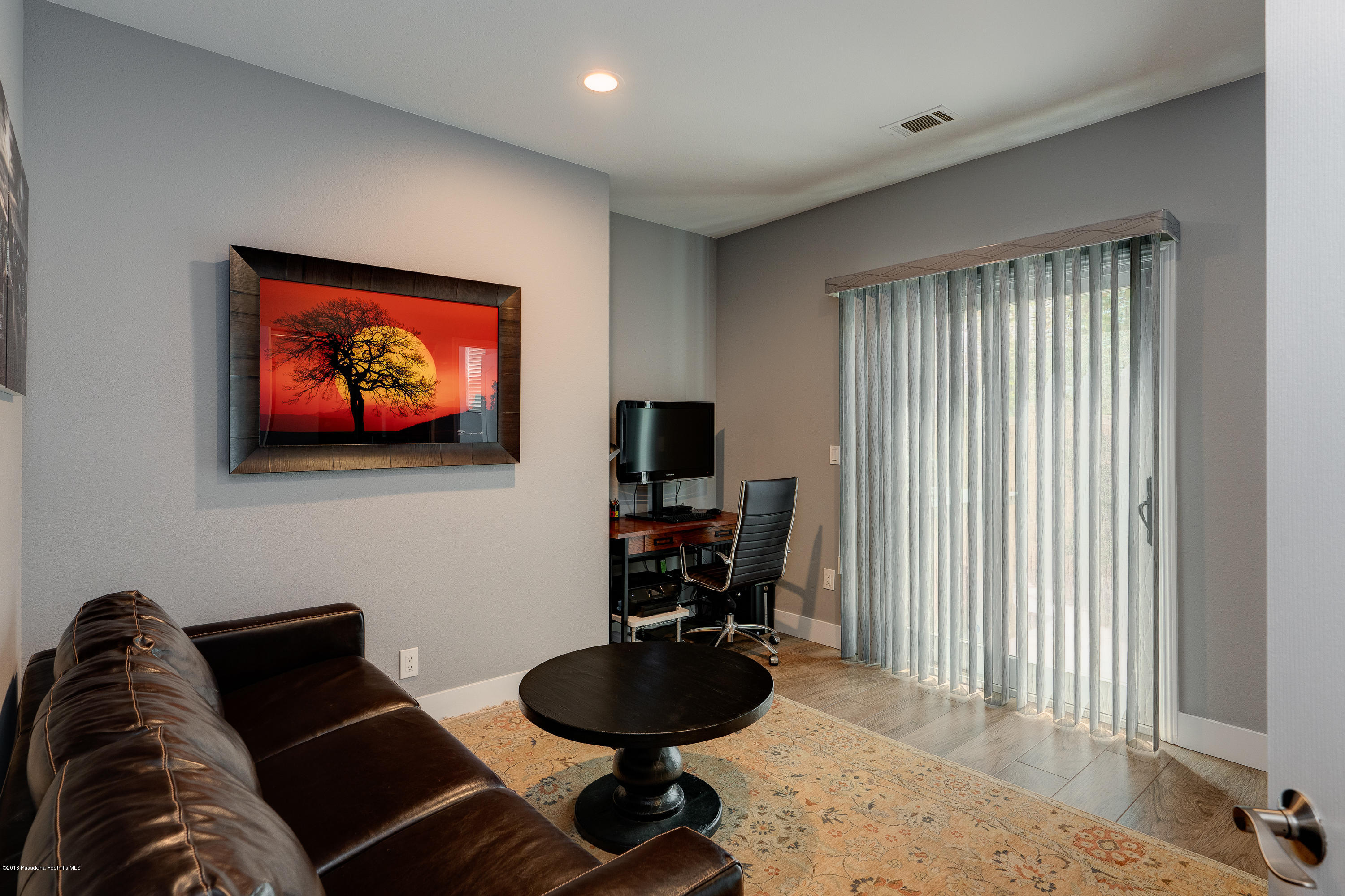 3503 Giddings Ranch Road Altadena, CA 91001 - Photo 22 of 75 a living room with furniture and a flat screen tv
