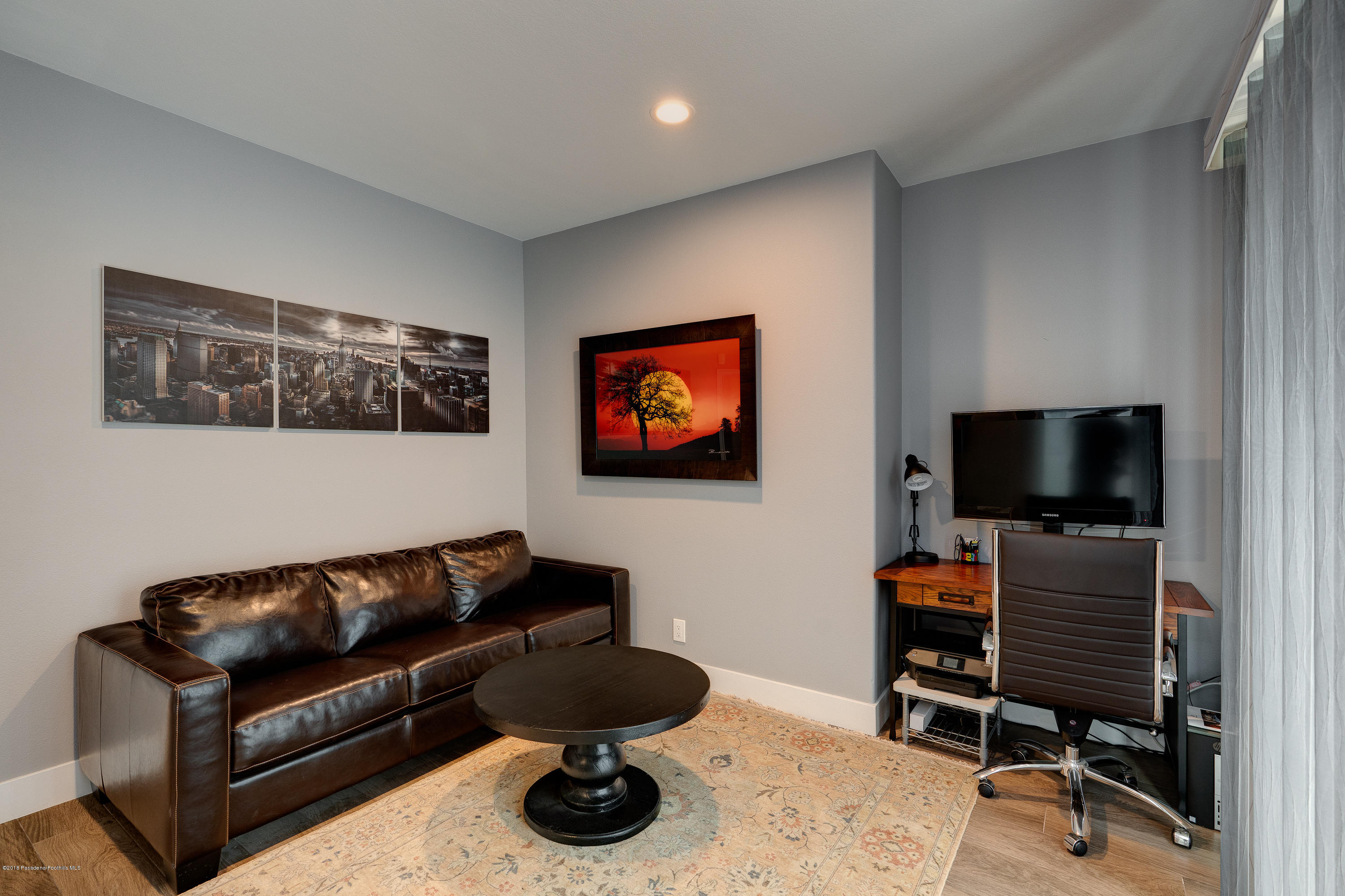3503 Giddings Ranch Road Altadena, CA 91001 - Photo 23 of 75 a living room with furniture and a flat screen tv