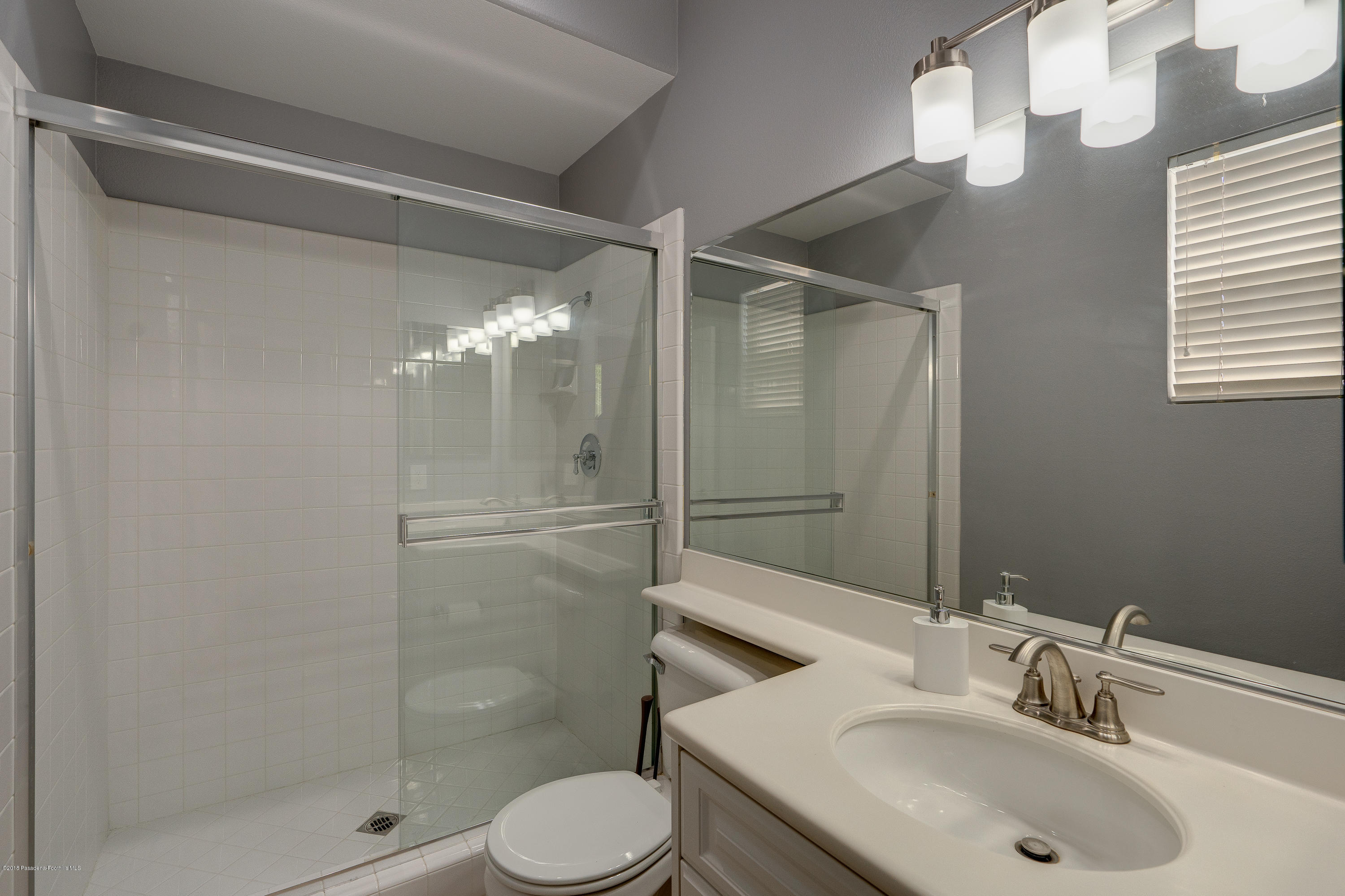 3503 Giddings Ranch Road Altadena, CA 91001 - Photo 24 of 75 a bathroom with a sink toilet and shower