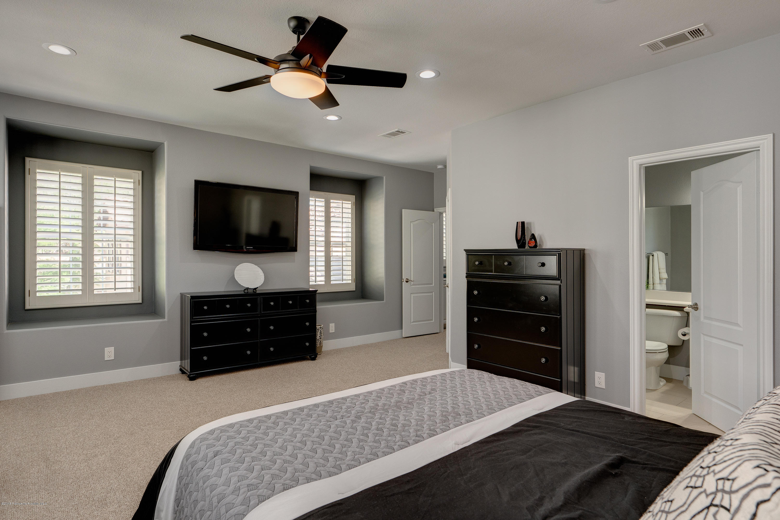 3503 Giddings Ranch Road Altadena, CA 91001 - Photo 38 of 75 a bedroom with a bed and a flat screen tv