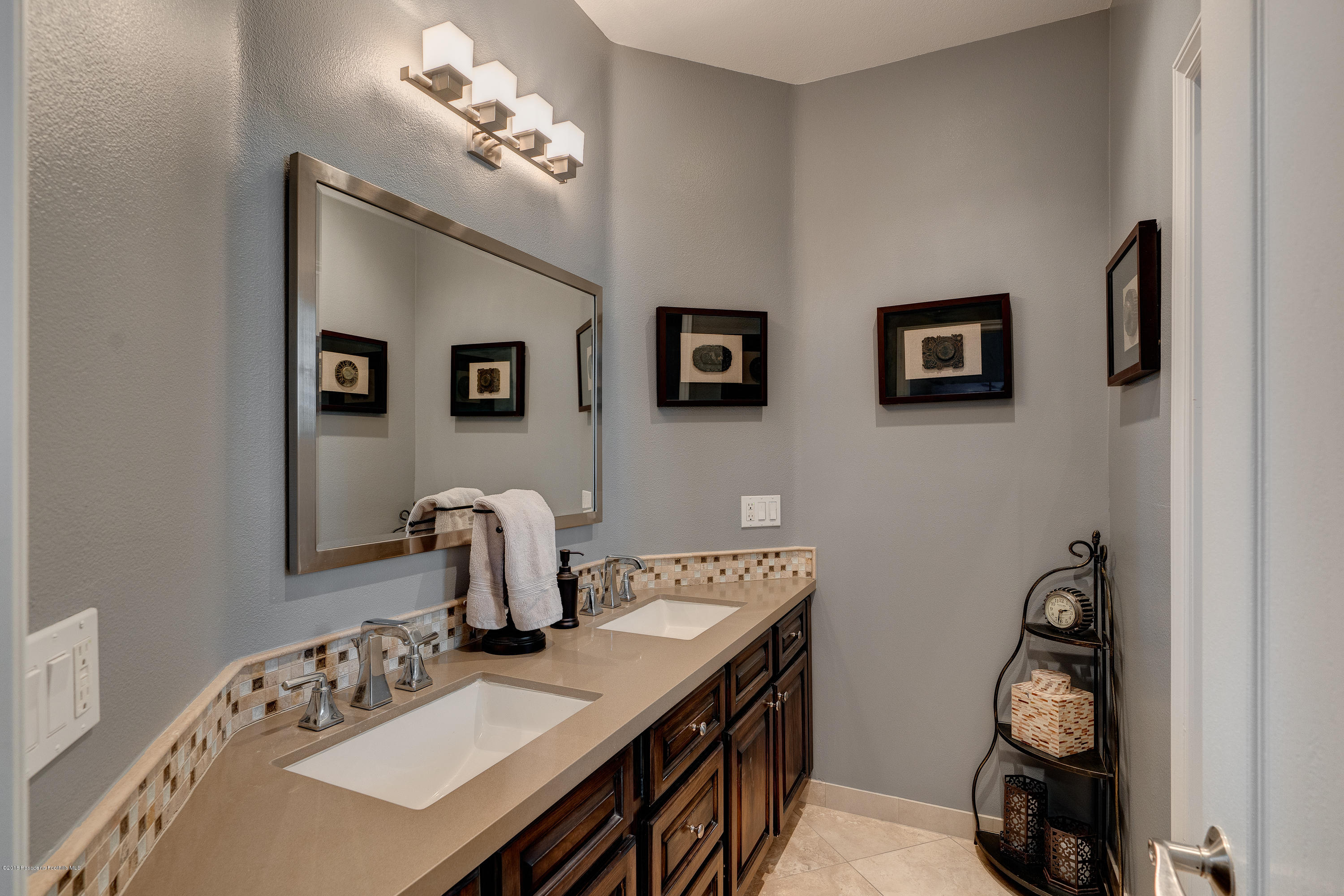 3503 Giddings Ranch Road Altadena, CA 91001 - Photo 43 of 75 a bathroom with a sink vanity and a mirror