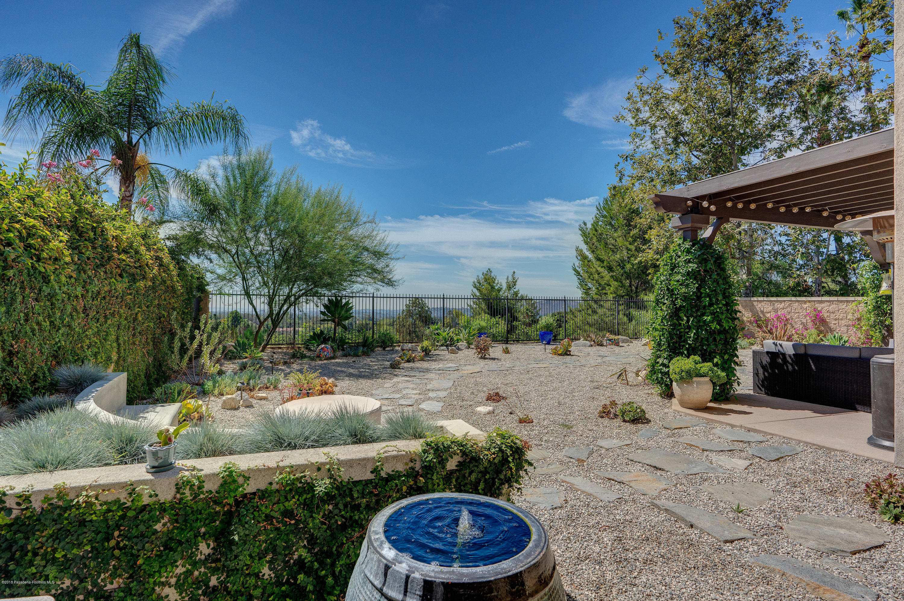 3503 Giddings Ranch Road Altadena, CA 91001 - Photo 51 of 75 a view of a backyard with plants and a patio
