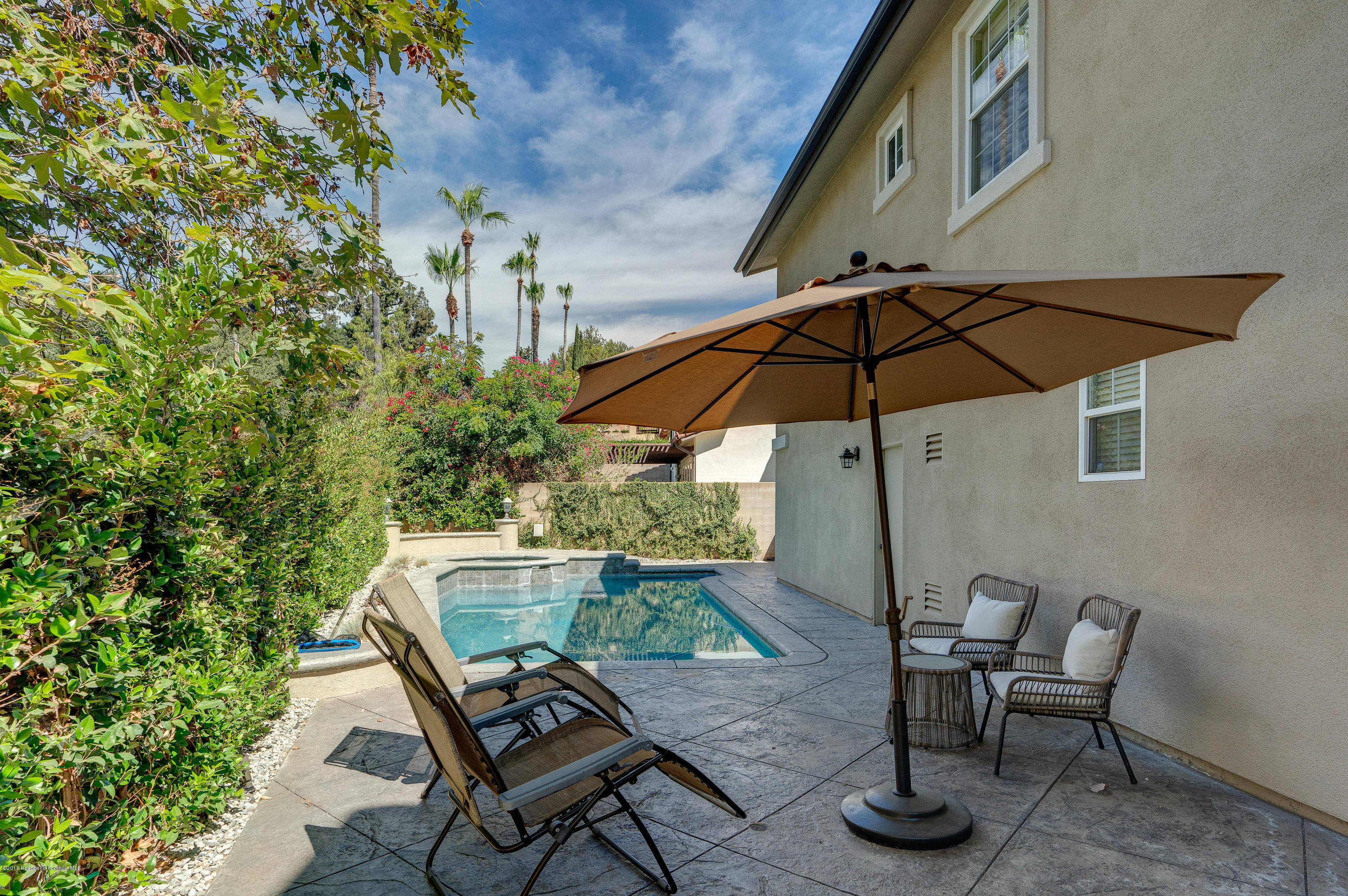 3503 Giddings Ranch Road Altadena, CA 91001 - Photo 61 of 75 a patio with a patio table and chairs