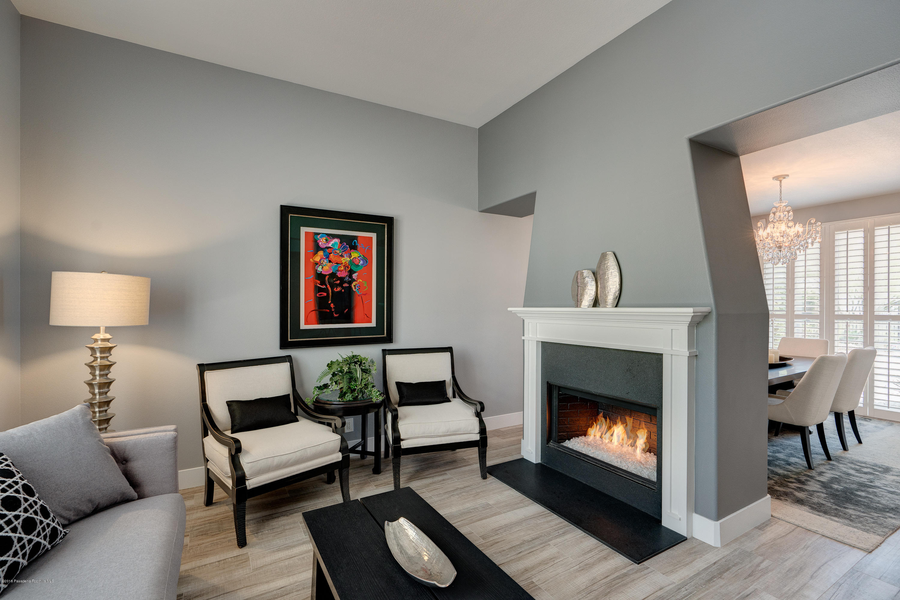 3503 Giddings Ranch Road Altadena, CA 91001 - Photo 8 of 75 a living room with furniture and a fireplace