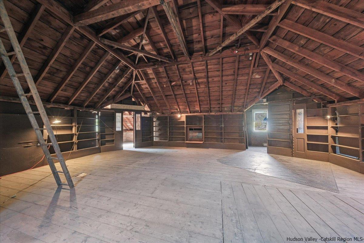 28 Maple Avenue Highland, NY 12528 - Photo 12 of 15 a view of an empty room with wooden roof and racks