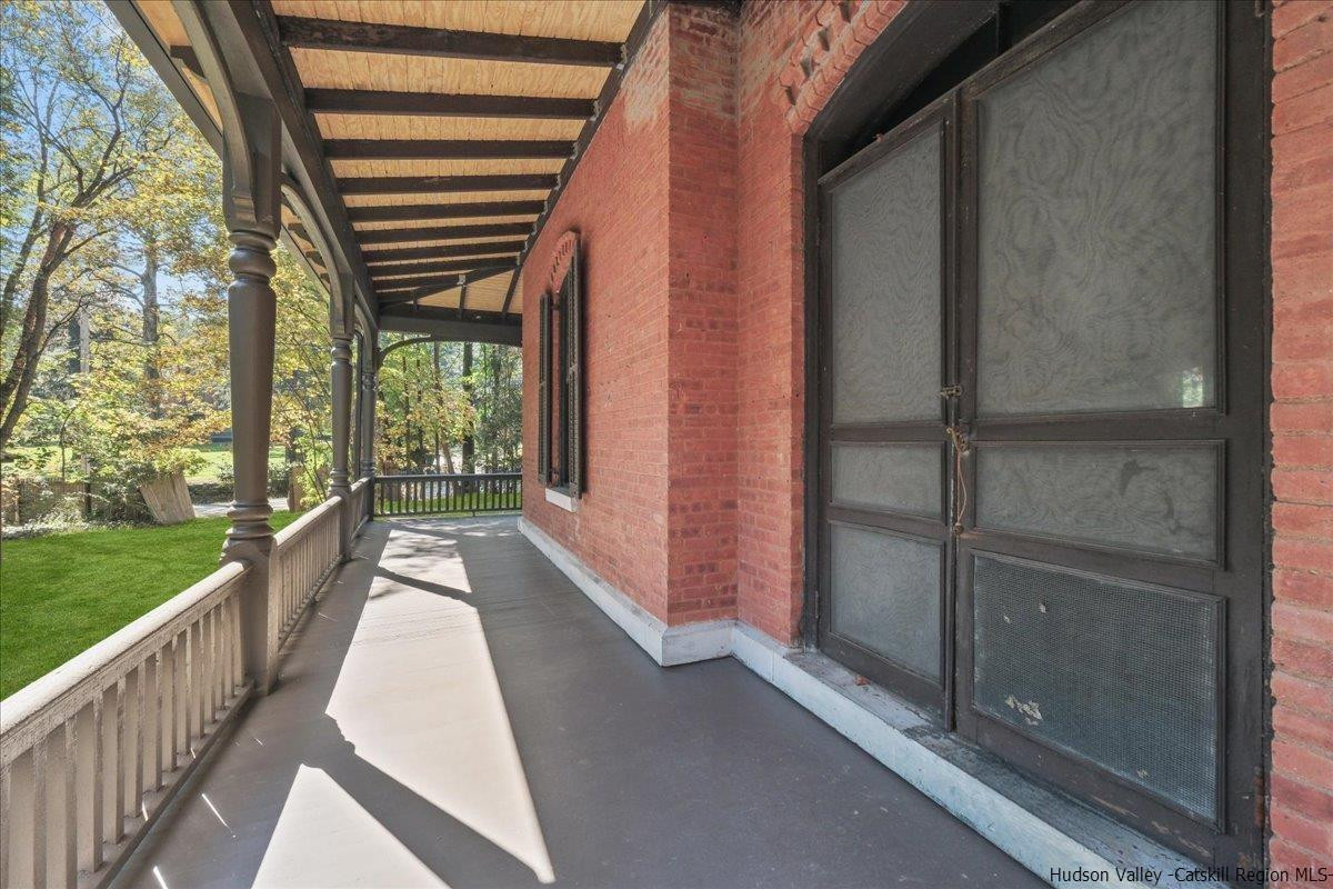 28 Maple Avenue Highland, NY 12528 - Photo 13 of 15 a view of porch with a couch