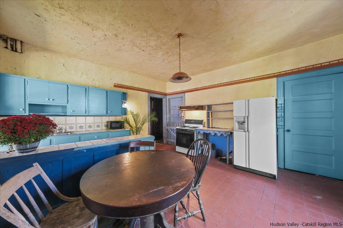 28 Maple Avenue Highland, NY 12528 - Photo 4 of 15 a dining room with furniture and window