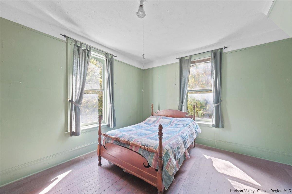 28 Maple Avenue Highland, NY 12528 - Photo 8 of 15 a bedroom with a bed and a window