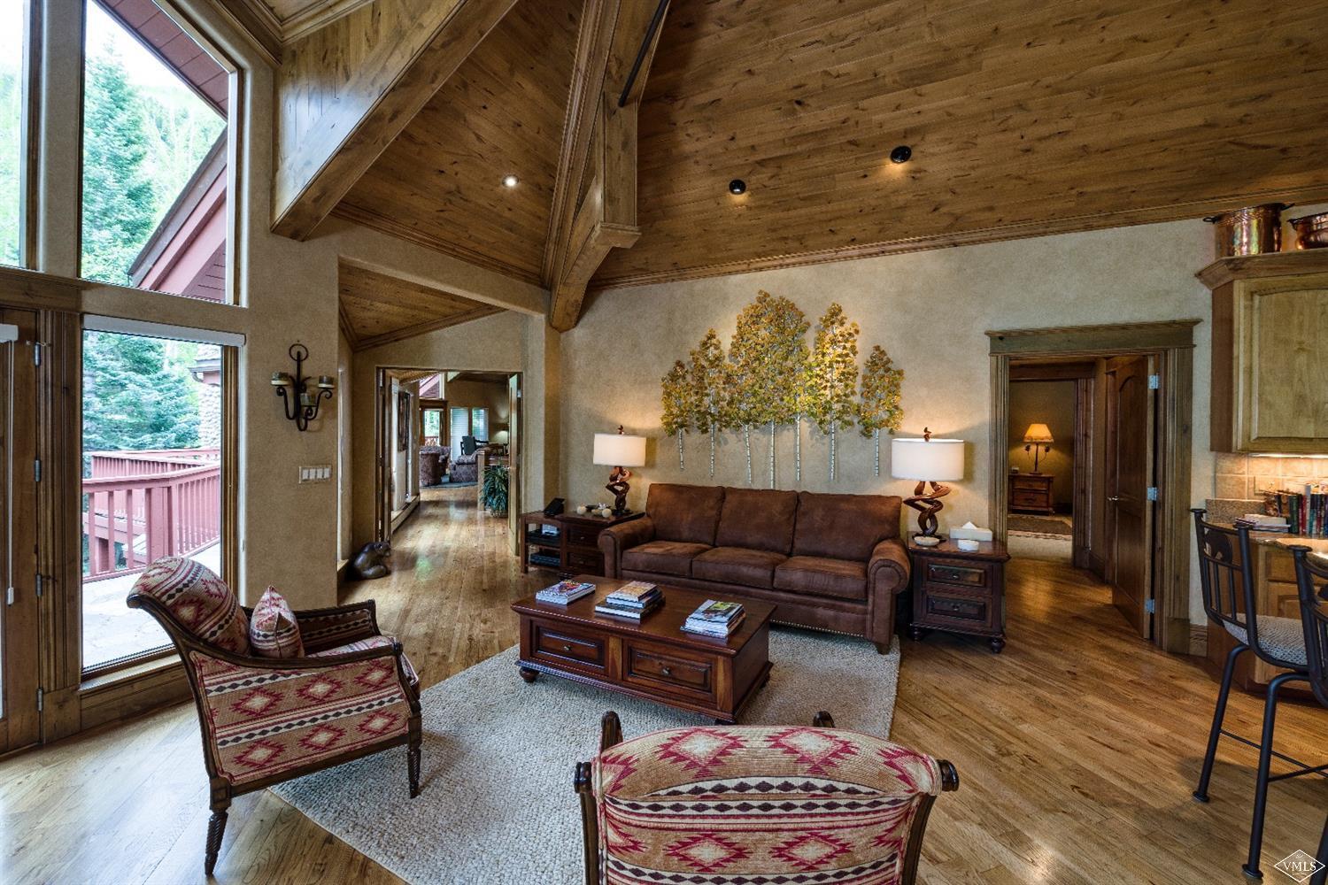 1944 Sunburst Drive, Unit A&B Vail, CO 81657 - Photo 11 of 37 a living room with furniture and a large window