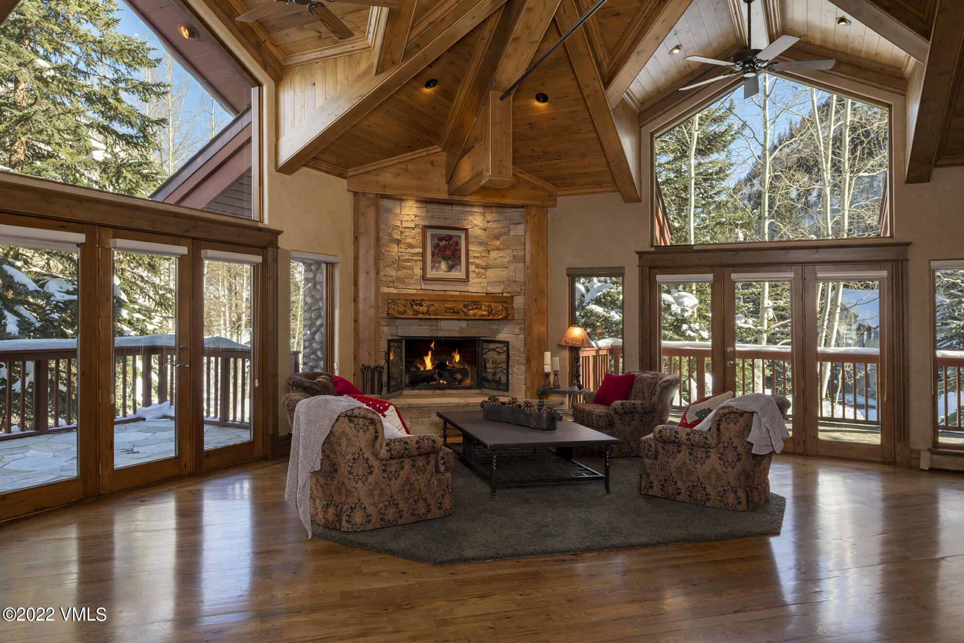 1944 Sunburst Drive, Unit A&B Vail, CO 81657 - Photo 15 of 37 a living room with furniture and a fireplace