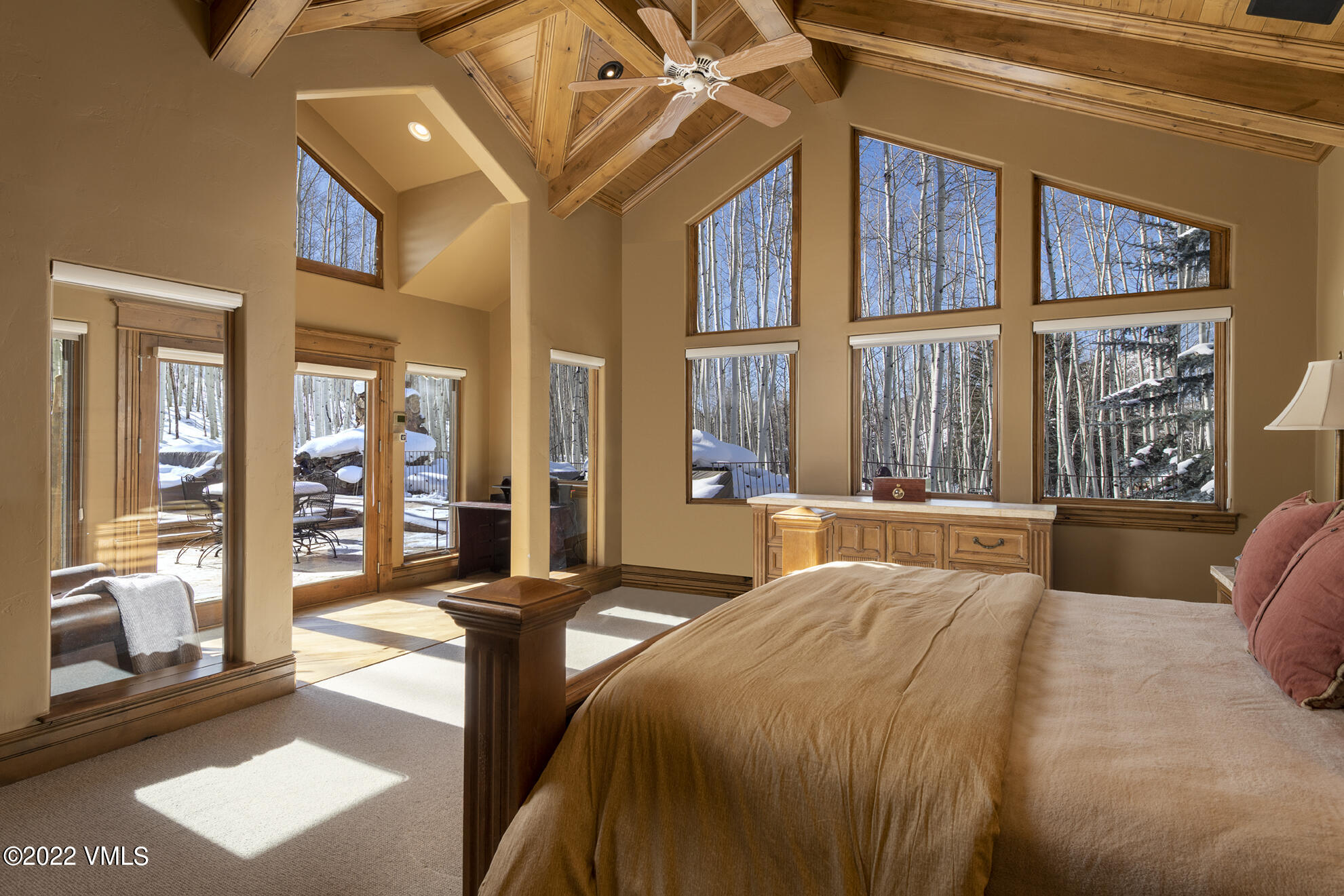 1944 Sunburst Drive, Unit A&B Vail, CO 81657 - Photo 18 of 37 a large bedroom with a large bed and a large window