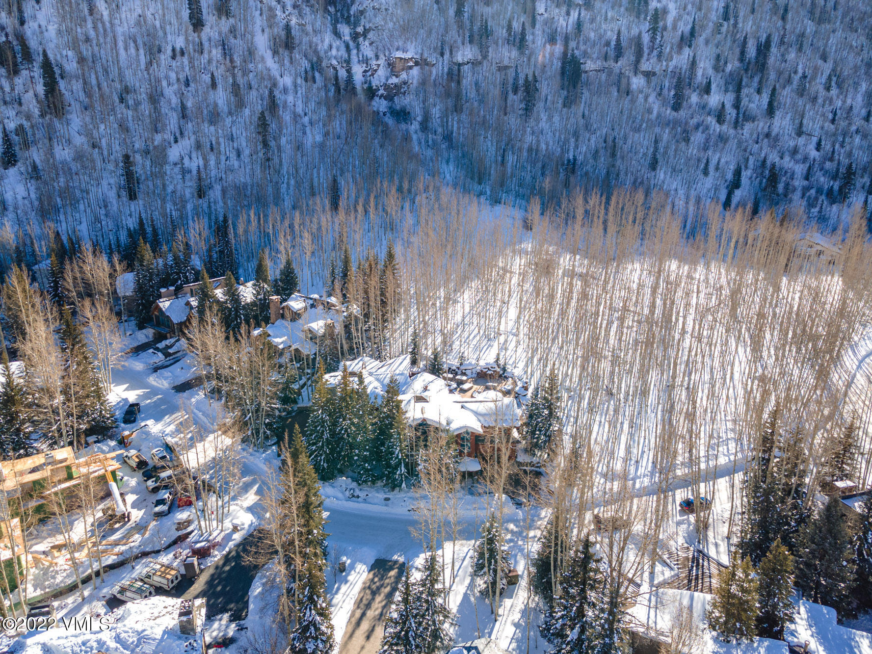 1944 Sunburst Drive, Unit A&B Vail, CO 81657 - Photo 32 of 37 a view of a lot of trees with wooden fence