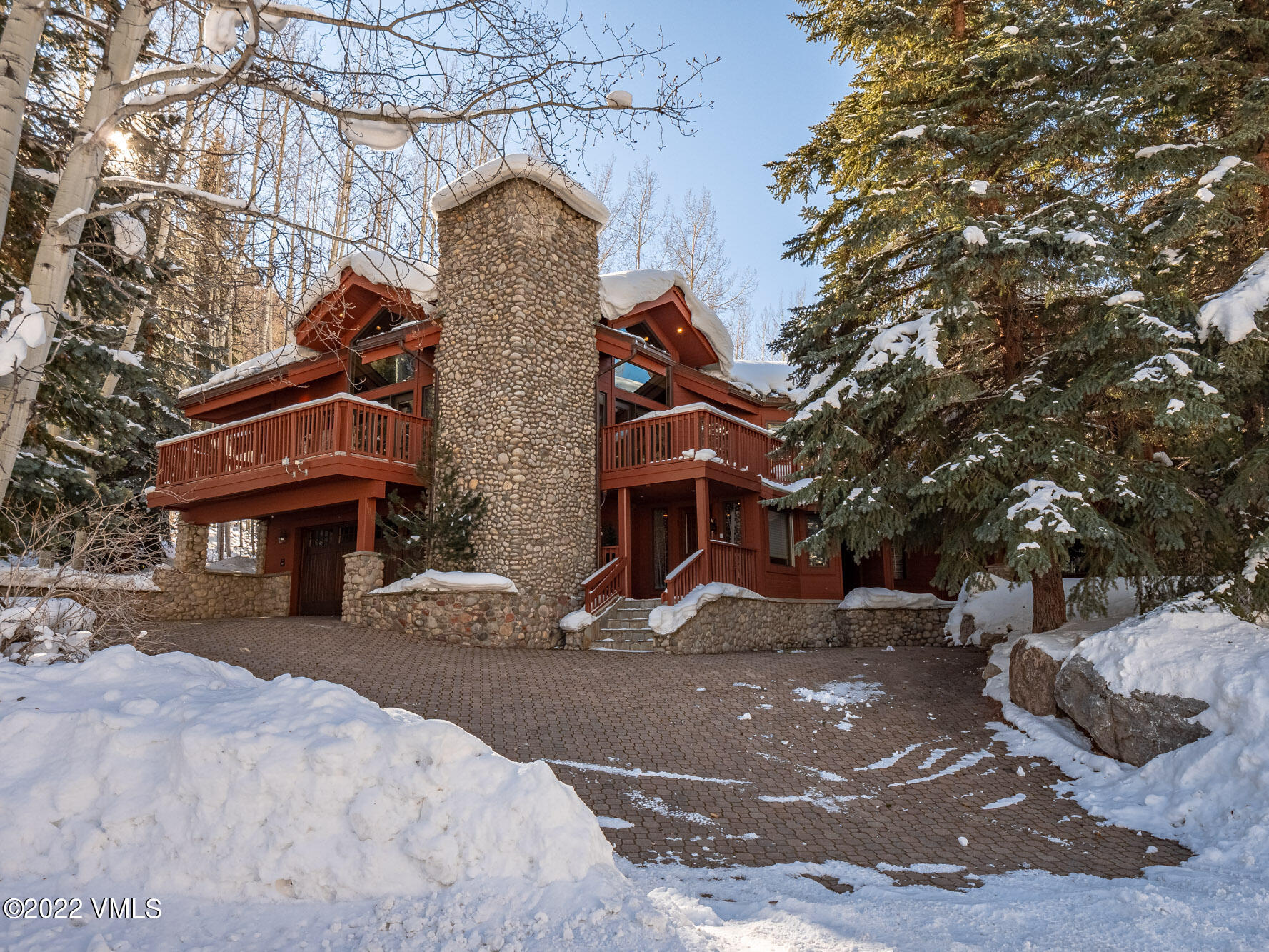 1944 Sunburst Drive, Unit A&B Vail, CO 81657 - Photo 33 of 37 a front view of a house with a yard