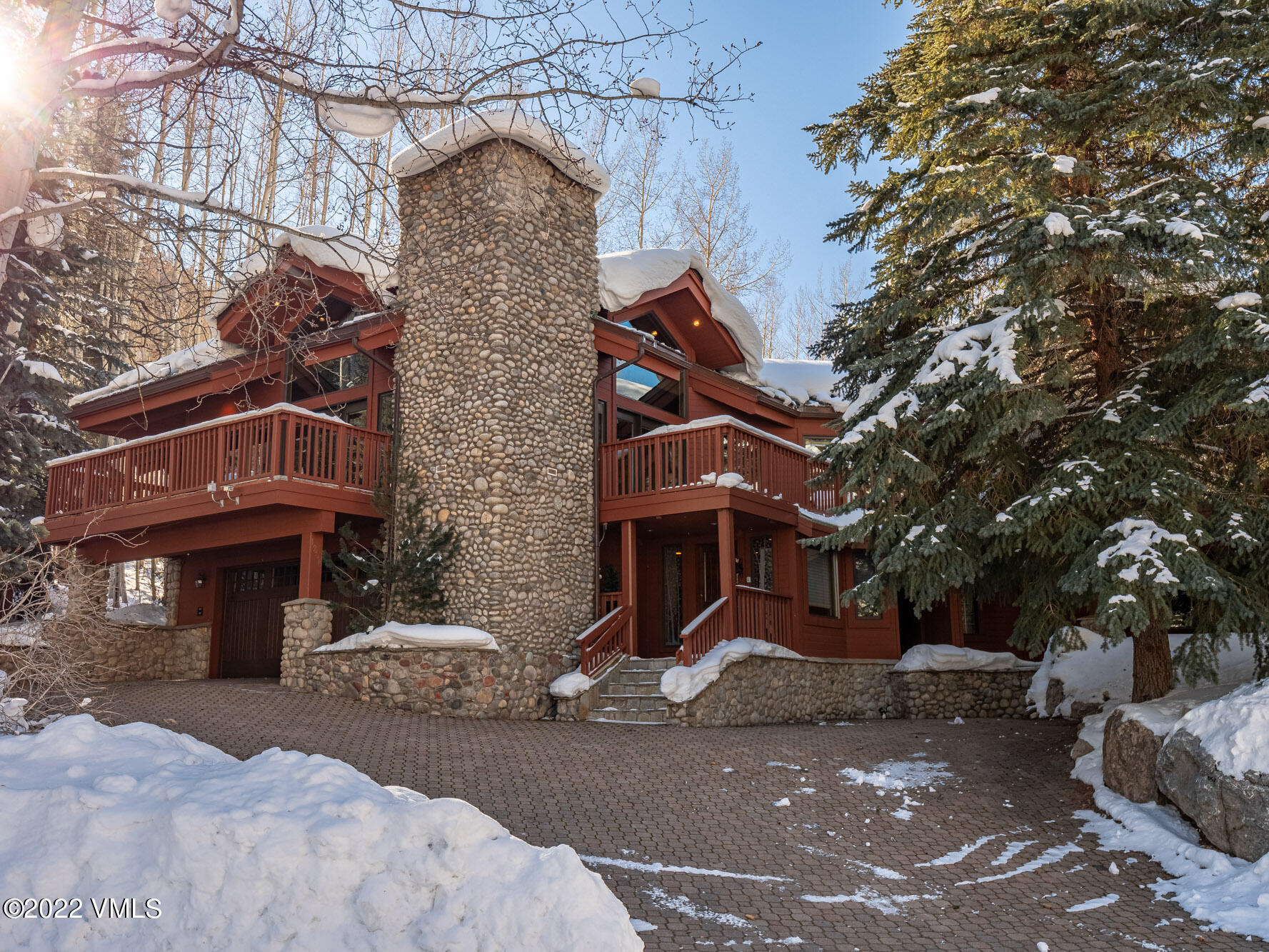 1944 Sunburst Drive, Unit A&B Vail, CO 81657 - Photo 34 of 37 a front view of a house with a tree