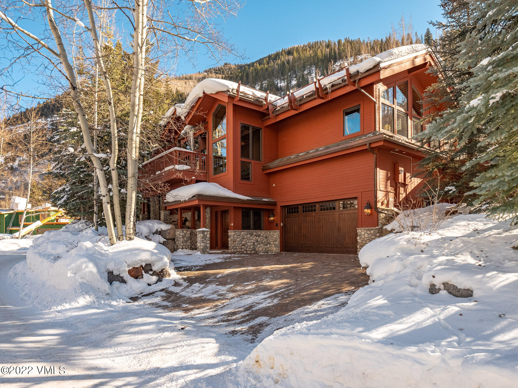 1944 Sunburst Drive, Unit A&B Vail, CO 81657 - Photo 36 of 37 a view of a house with a snow in the yard