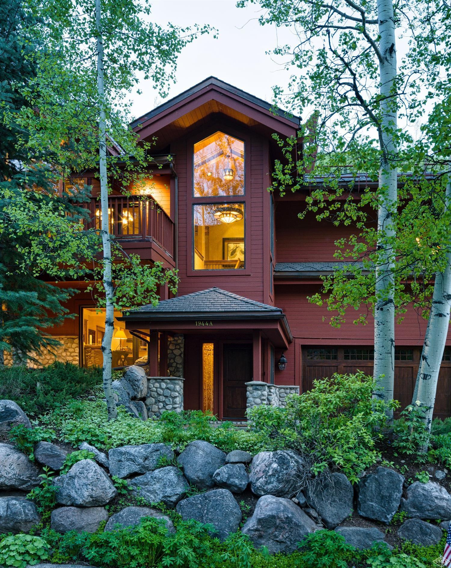 1944 Sunburst Drive, Unit A&B Vail, CO 81657 - Photo 5 of 37 a front view of a house with garden