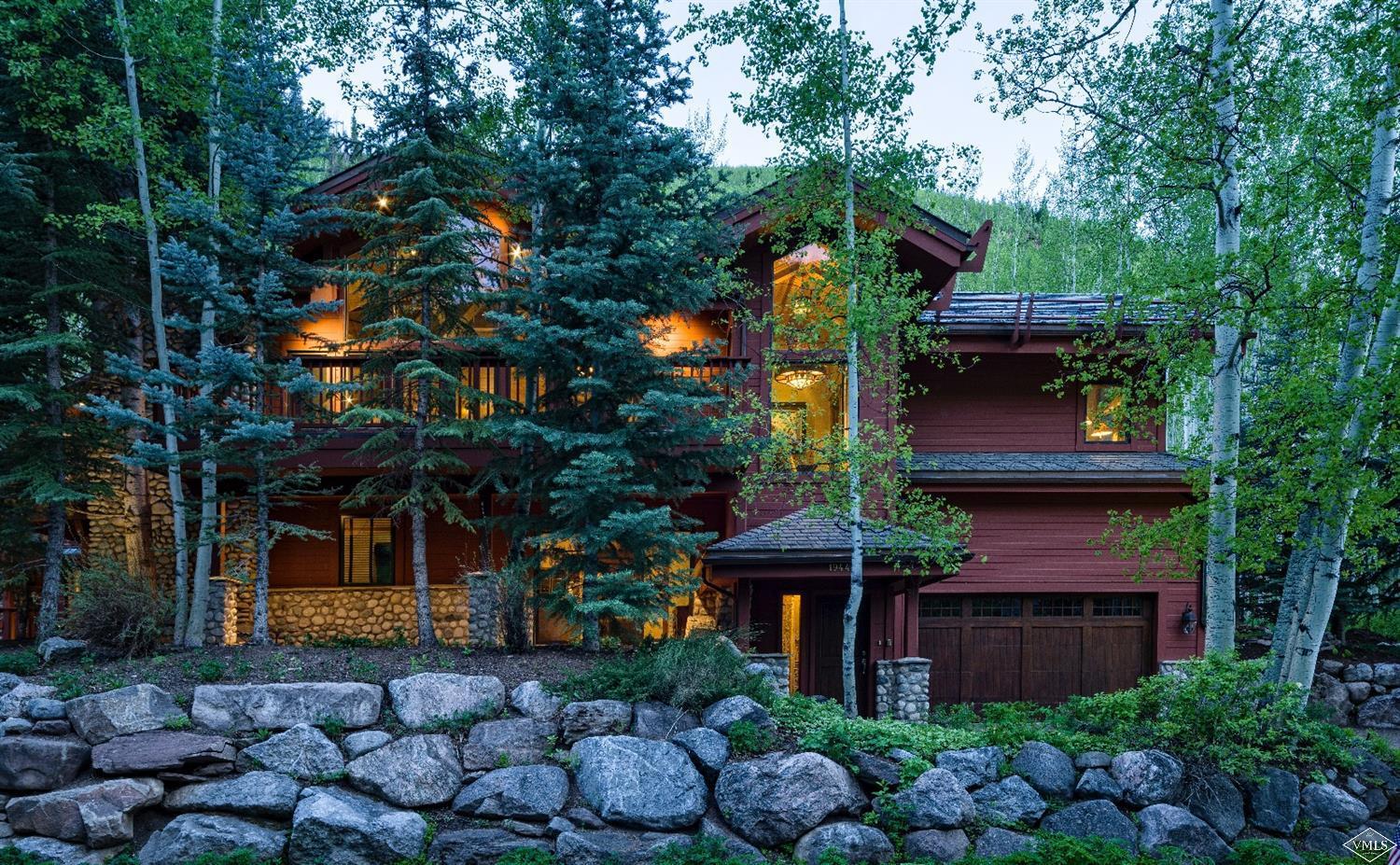 1944 Sunburst Drive, Unit A&B Vail, CO 81657 - Photo 6 of 37 front view of a house with a tree
