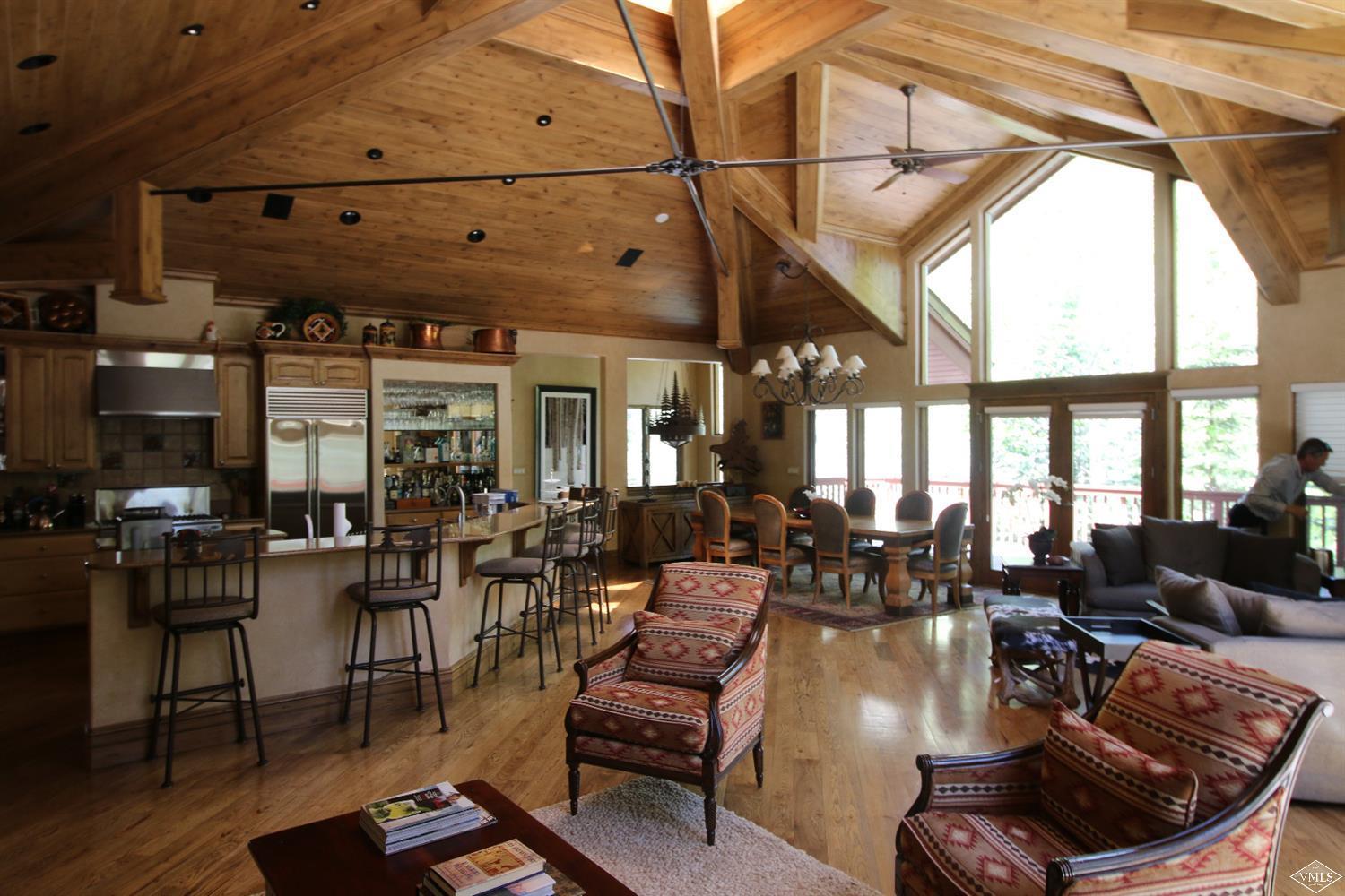 1944 Sunburst Drive, Unit A&B Vail, CO 81657 - Photo 8 of 37 a living room with furniture and a large window