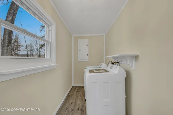 a utility room with dryer and washer