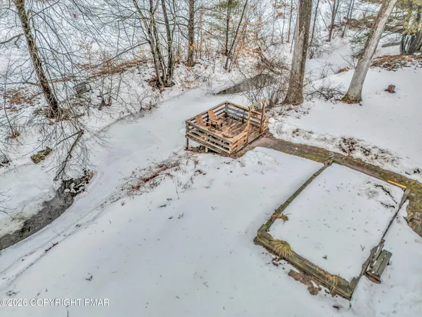 a view of a backyard of the house