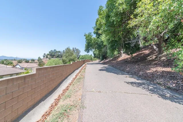a view of an chairs and table in the patio