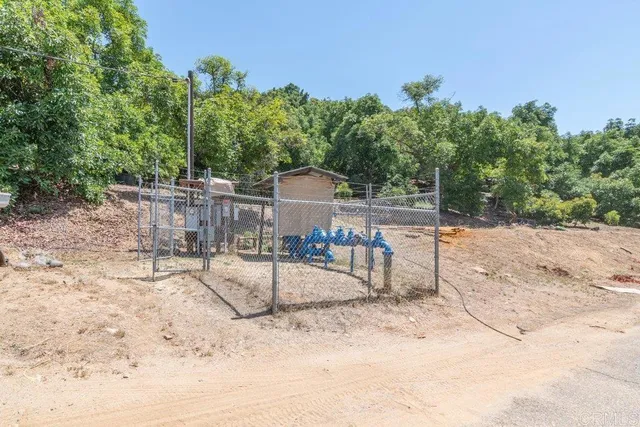 a view of backyard of a house