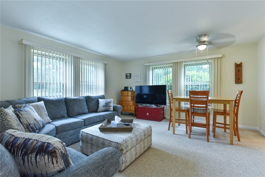 3524 West Shore Road, Unit 910 Warwick, RI 02886 - Photo 3 of 18 Living Room With Dining Area