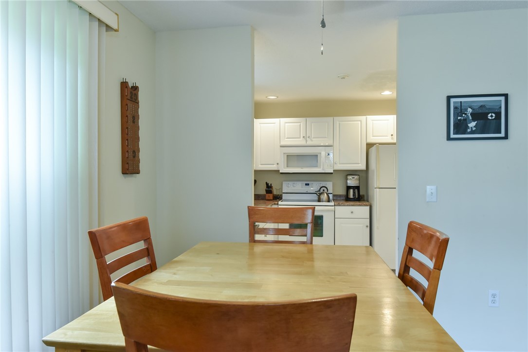 3524 West Shore Road, Unit 910 Warwick, RI 02886 - Photo 5 of 18 Dining area view into Kitchen