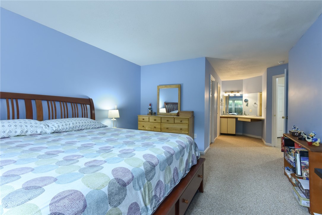 3524 West Shore Road, Unit 910 Warwick, RI 02886 - Photo 9 of 18 Master Bedroom with Walk-In Closet and en-suite Full Bath!