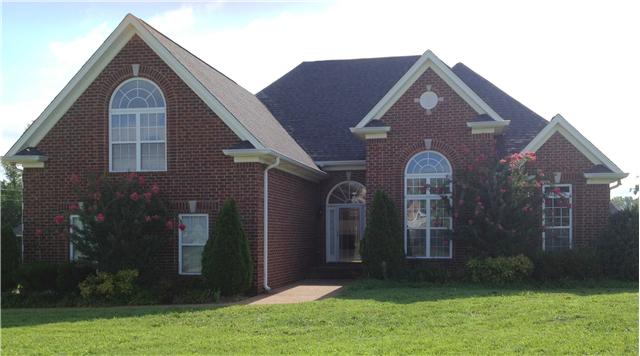 719 Heritage Road Lebanon, TN 37087 - Photo 1 of 6 a front view of a house with a yard